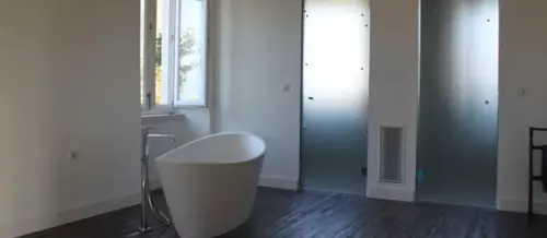 Free standing white bath chrome tap